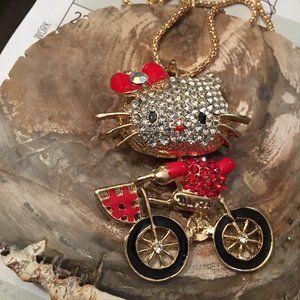 Hello Kitty On Bicycle Pendant Necklace NEW   Dr6